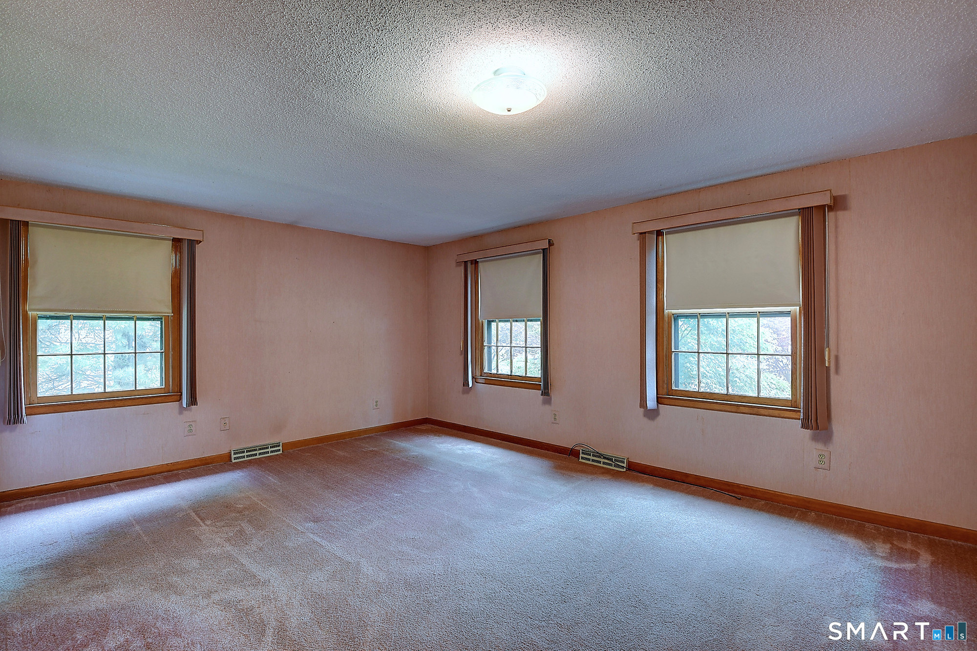 80 Grist Mill Road Wethersfield, CT 06109 - Photo 26 of 40 an empty room with windows