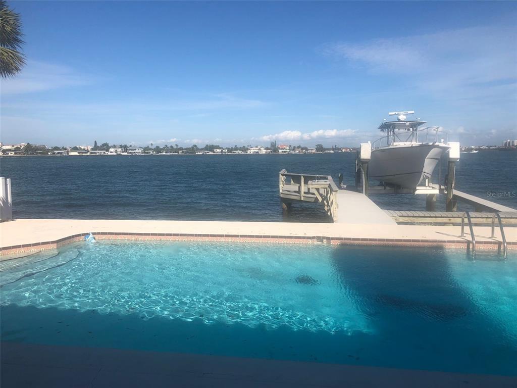 a view of a lake from a yard