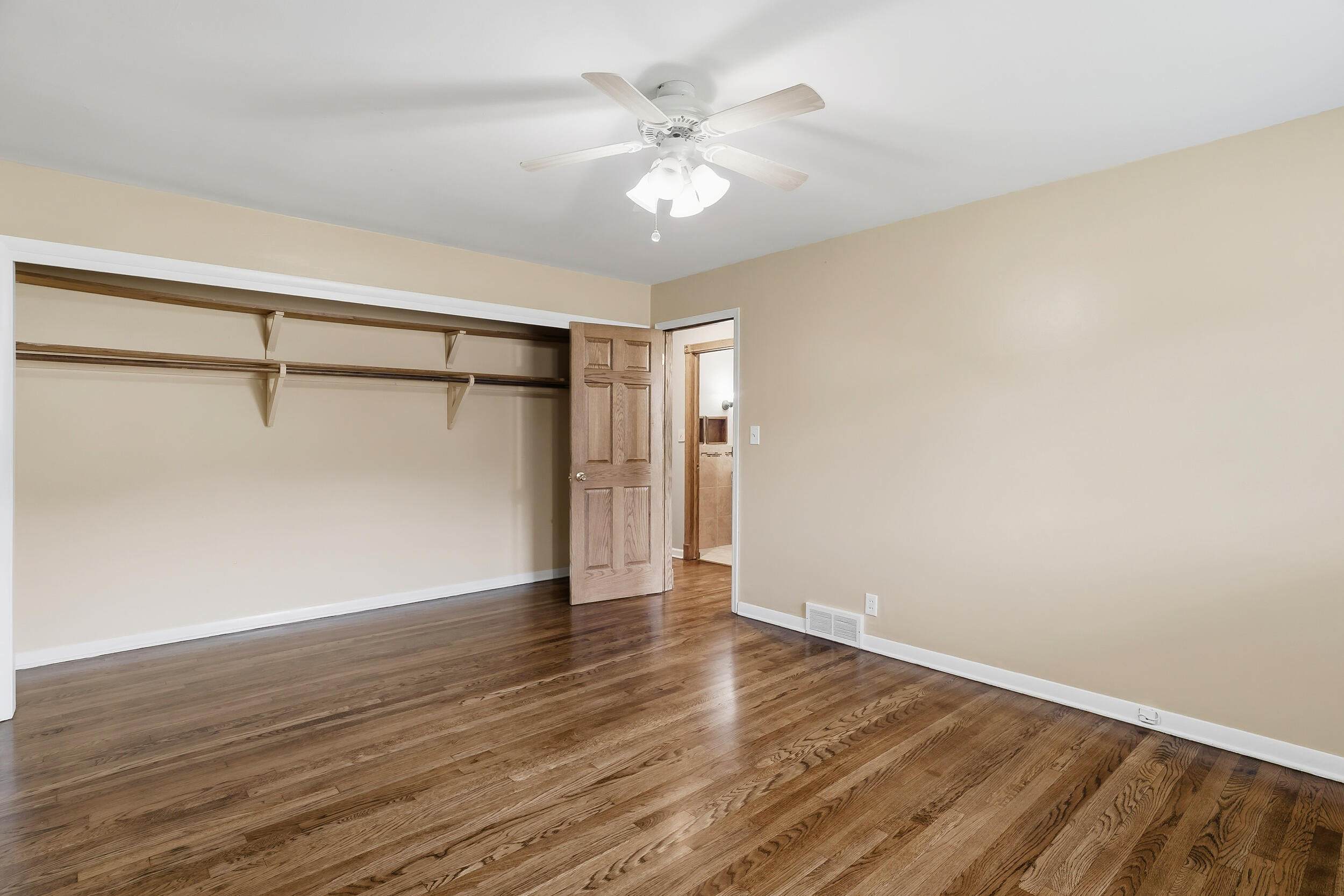 10710 Porter Street Crown Point, IN 46307 - Photo 38 of 65 a view of an empty room with wooden floor