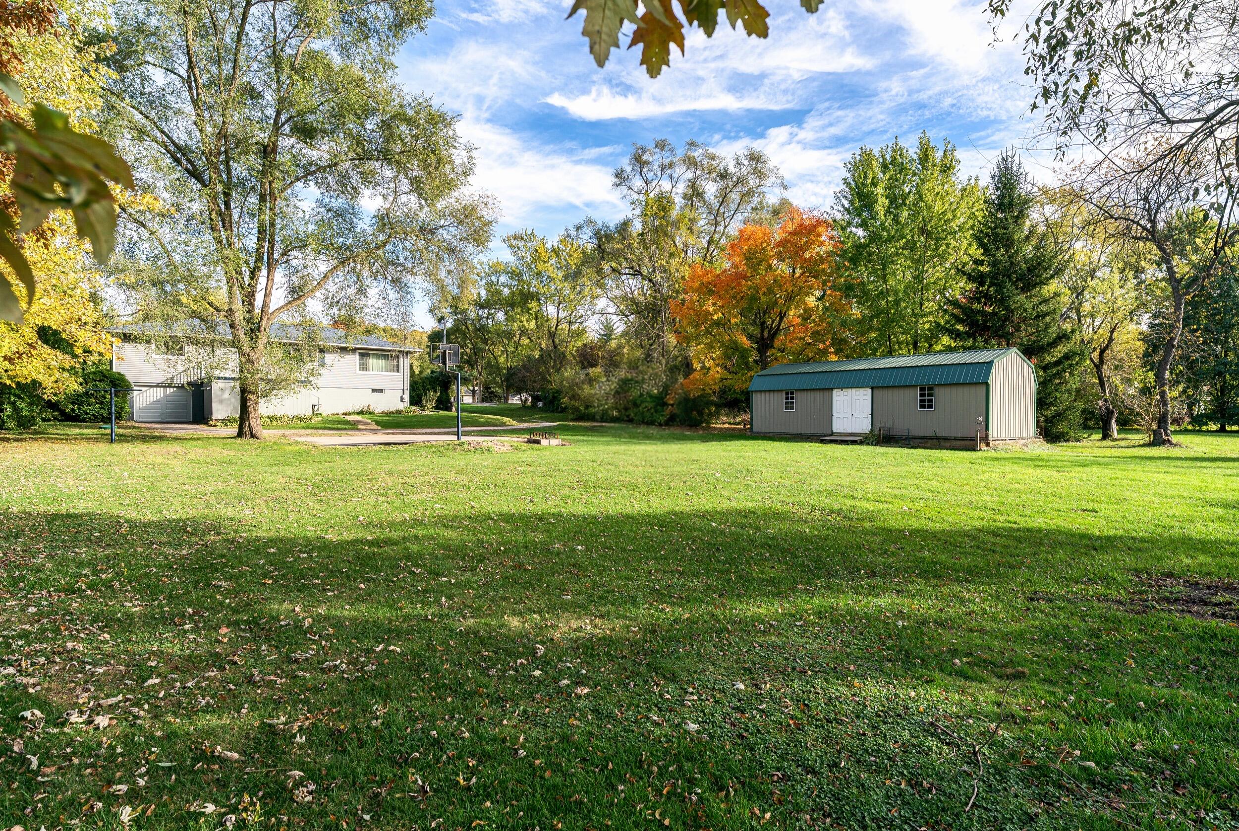 10710 Porter Street Crown Point, IN 46307 - Photo 54 of 65 a view of a house with a yard