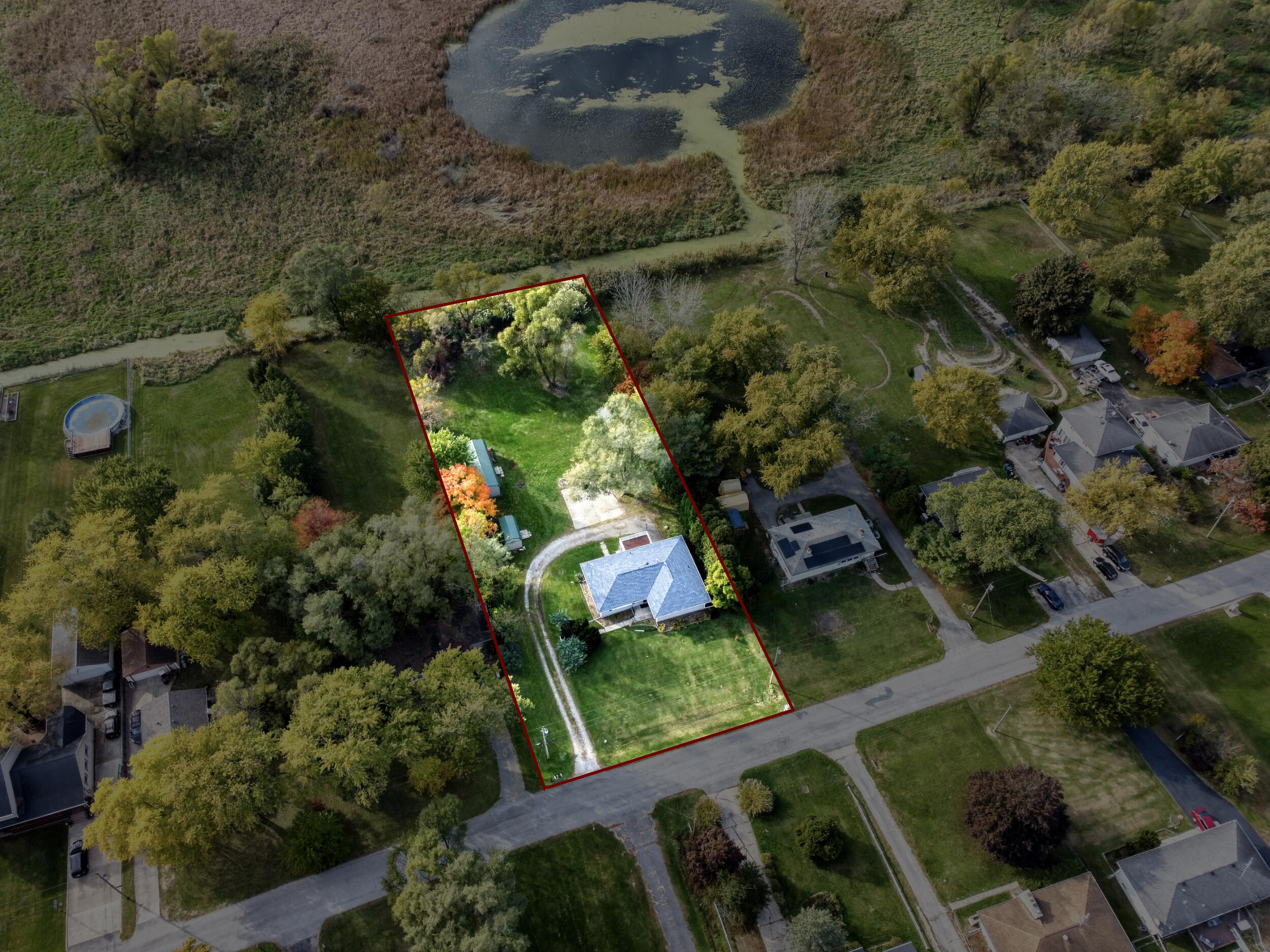 10710 Porter Street Crown Point, IN 46307 - Photo 57 of 65 an aerial view of residential houses with outdoor space