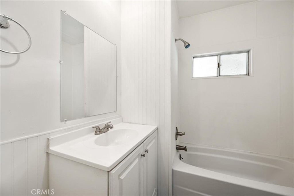 3210 Santa Maria Way, Unit 49 Santa Maria, CA 93455 - Photo 20 of 50 a bathroom with a sink a toilet and bathtub