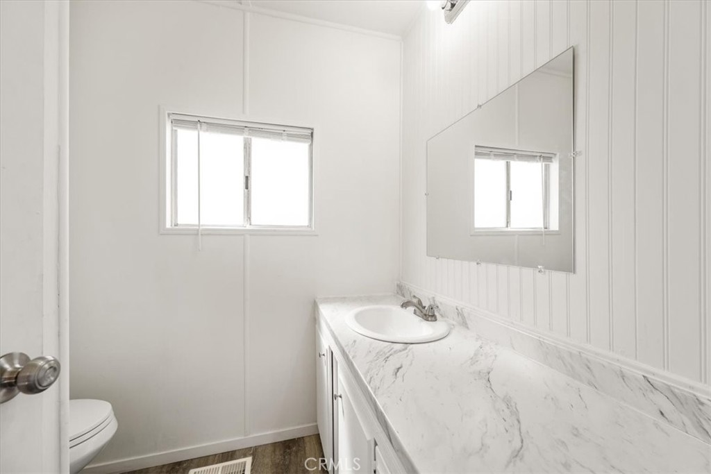 3210 Santa Maria Way, Unit 49 Santa Maria, CA 93455 - Photo 23 of 50 a bathroom with a sink toilet and vanity