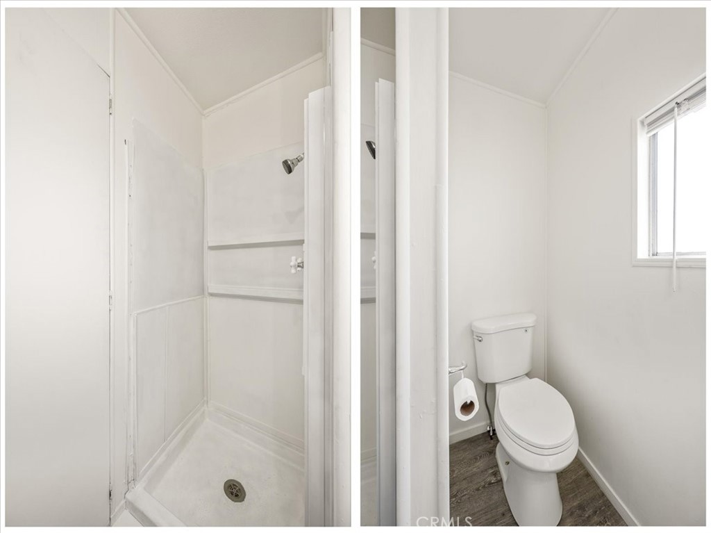 3210 Santa Maria Way, Unit 49 Santa Maria, CA 93455 - Photo 26 of 50 a white toilet sitting next to a bathroom sink