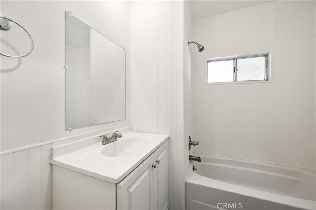 3210 Santa Maria Way, Unit 49 Santa Maria, CA 93455 - Photo 31 of 50 a bathroom with a sink a toilet and bathtub