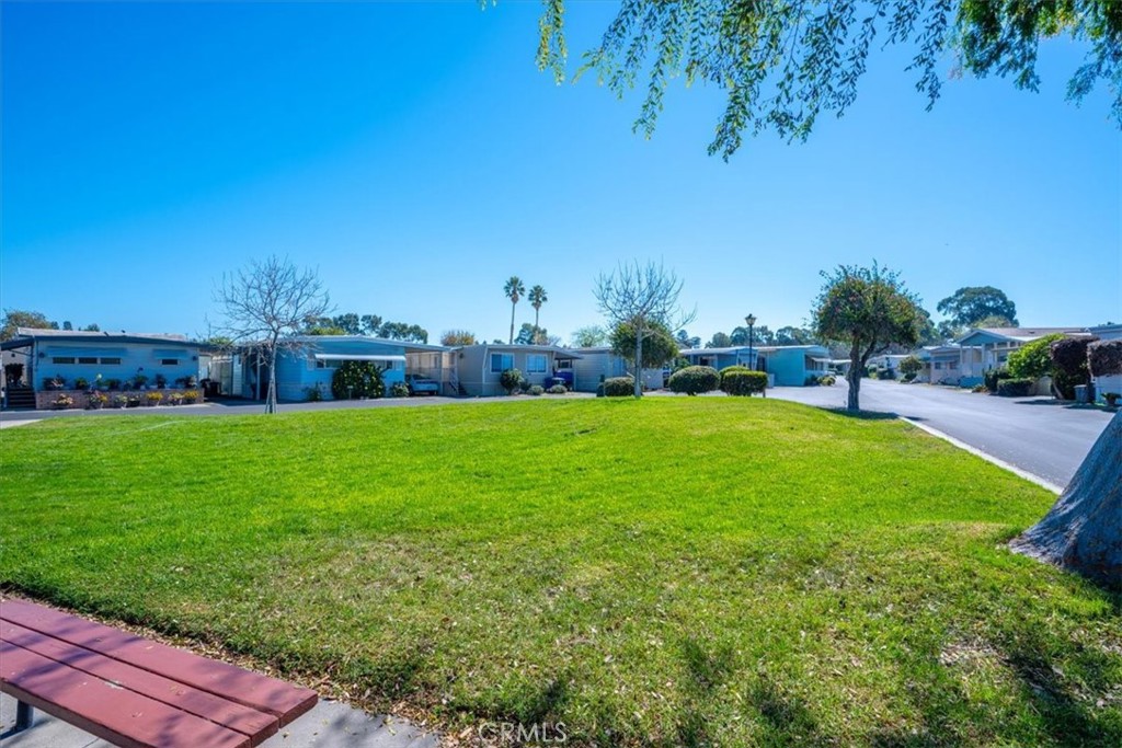 3210 Santa Maria Way, Unit 49 Santa Maria, CA 93455 - Photo 46 of 50 a view of house with garden and trees