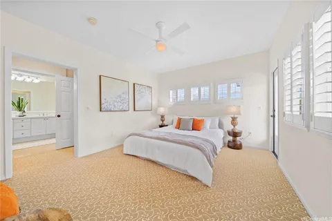 a bed room with a bed and a couch