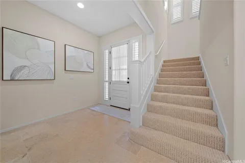 a view of an entryway with staircase