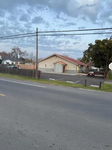 a view of street and electric pole