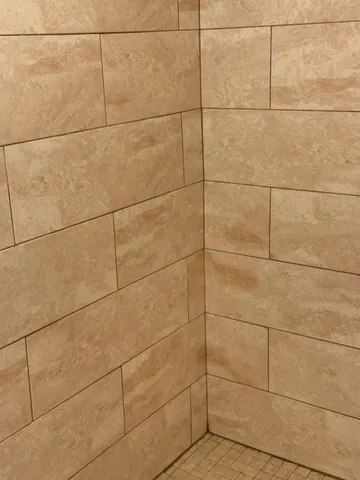 a bathroom with a toilet and a sink