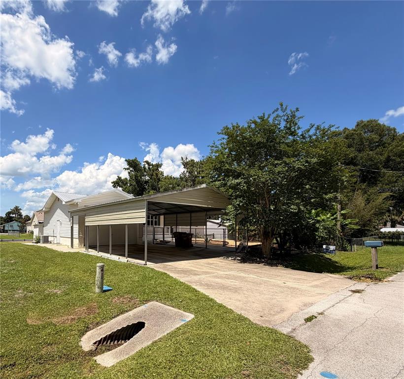 24521 Alligator Road Astor, FL 32102 - Photo 38 of 51 a view of house with yard