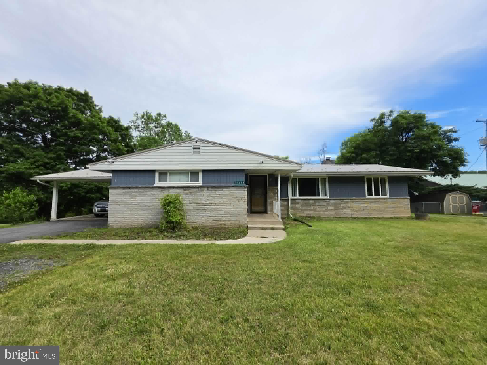 11275 Raystown Road Huntingdon, PA 16652 - Photo 1 of 29 Charming home with lush green surroundings.