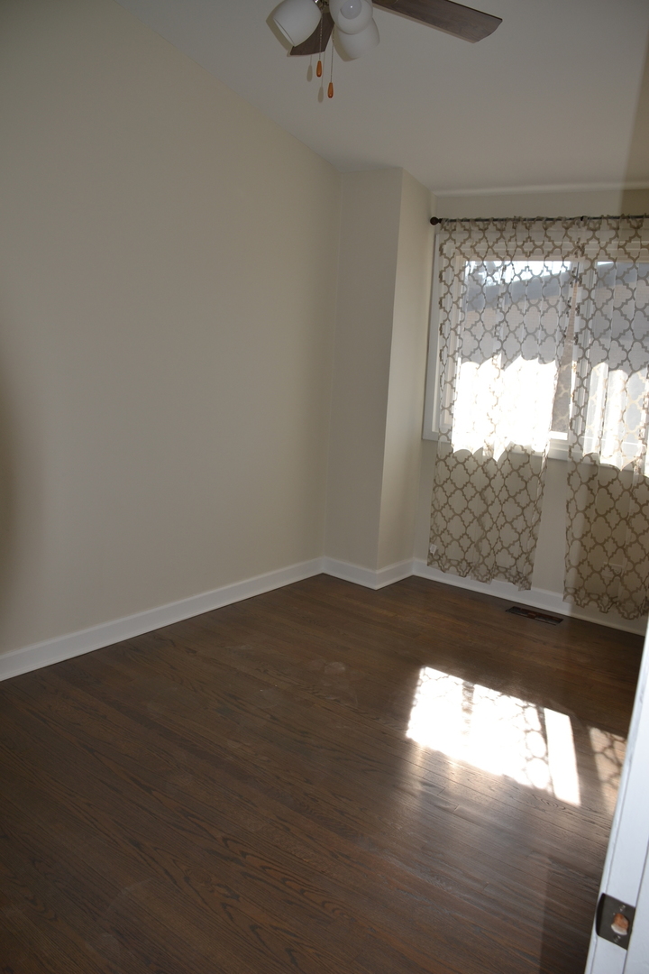 739 Hibbard Road Wilmette, IL 60091 - Photo 15 of 17 a view of lot of window and wooden floor