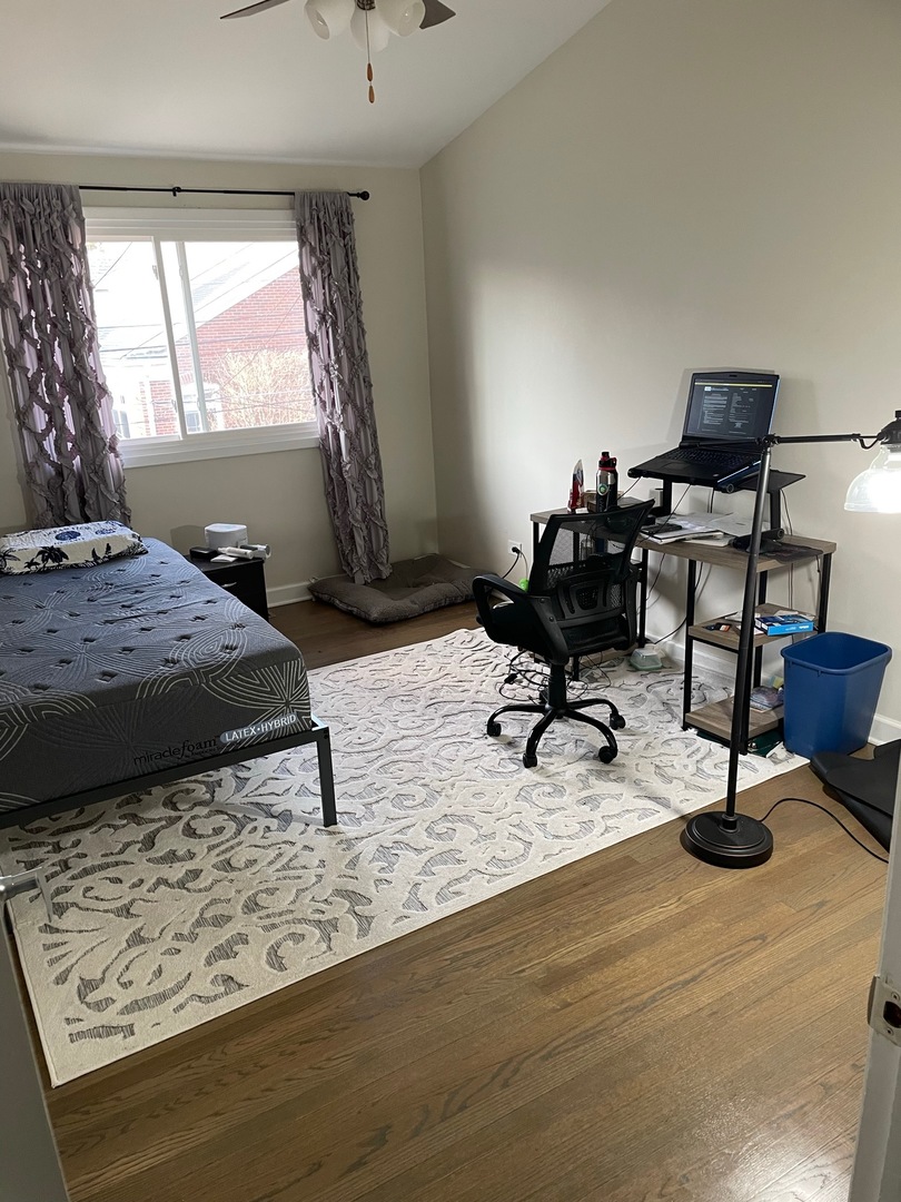 739 Hibbard Road Wilmette, IL 60091 - Photo 9 of 17 a bedroom with furniture and a window