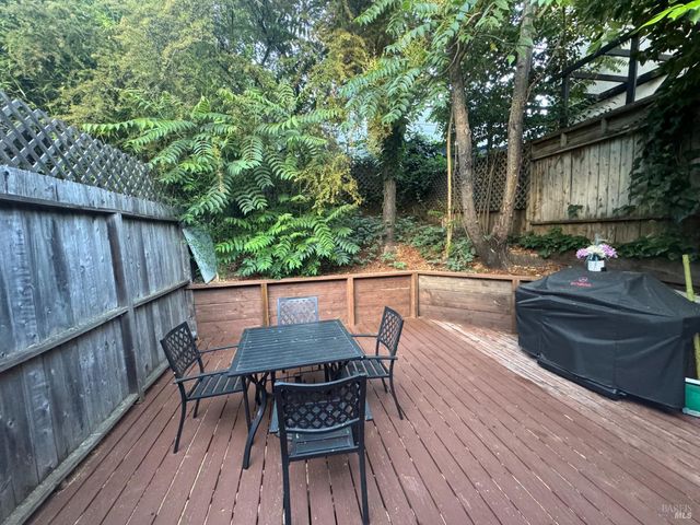 a view of a chairs and table on the wooden floor