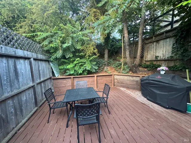 a view of a chairs and table on the wooden floor