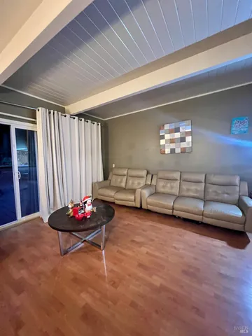 a living room with furniture and decor