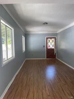 a view of an empty room and window