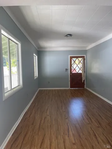 a view of an empty room and window