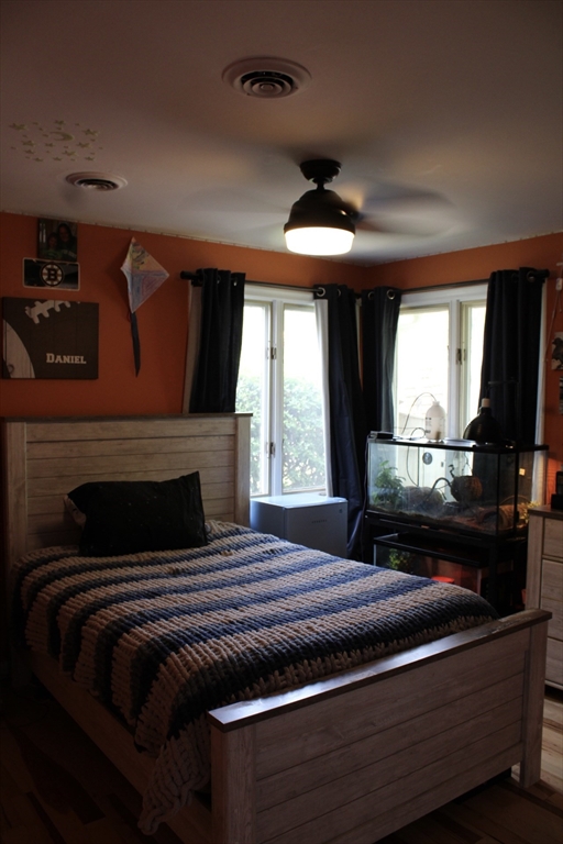 225 Braemoor Road Brockton, MA 02301 - Photo 14 of 29 a bedroom with a bed and a large window