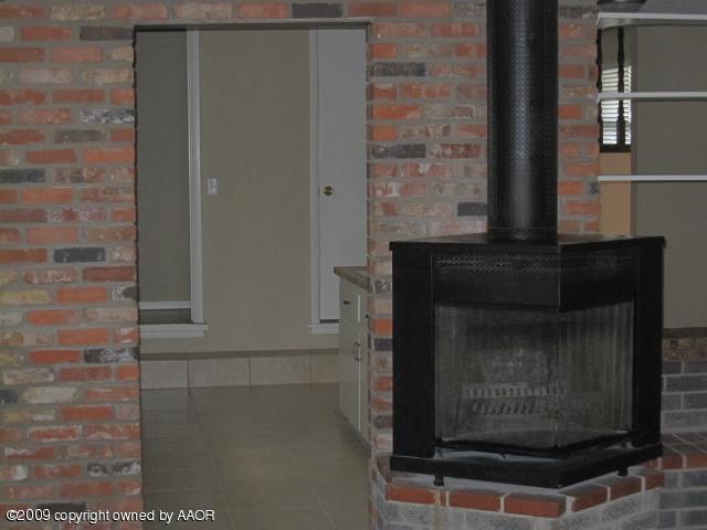 14001 Indian Hill Road Amarillo, TX 79124 - Photo 6 of 22 Wood Burning Fireplace in Family Room