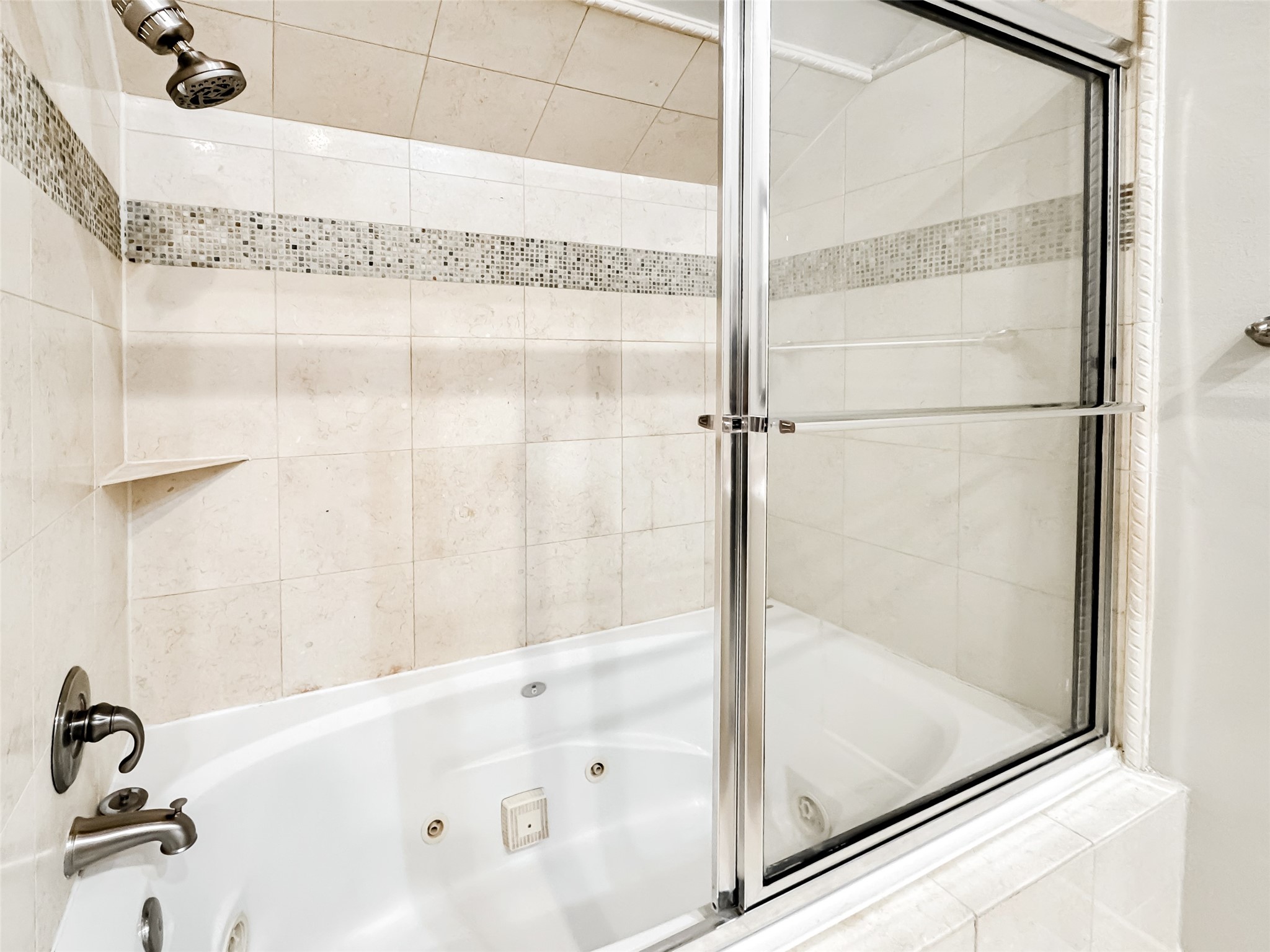 1602 Colorado Street Houston, TX 77007 - Photo 14 of 29 a bathroom with a bathtub and shower