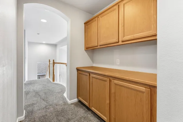 a view of a kitchen with electric appliances