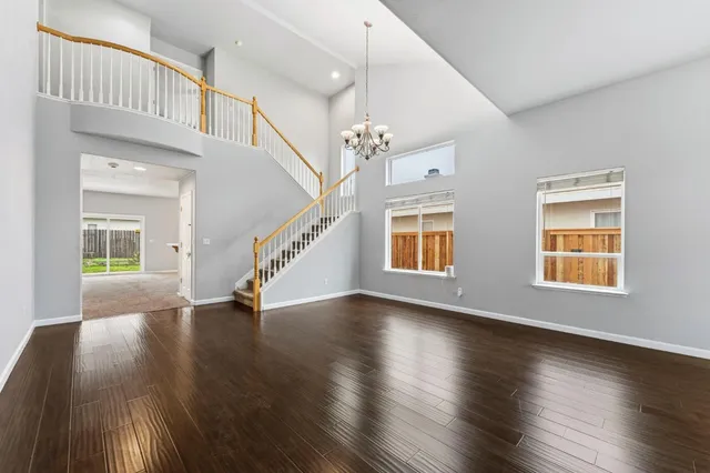 a view of an entryway with wooden floor