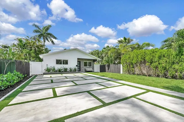 a house view with a garden space