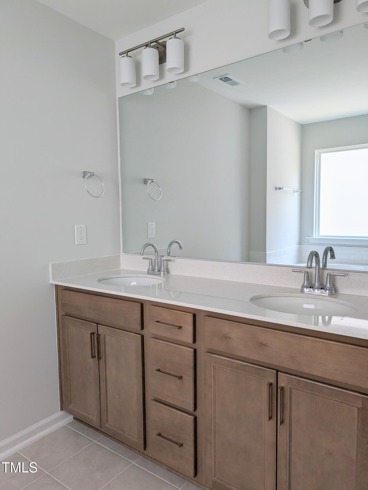 9224 Leaning Post Road, Unit 445 Wake Forest, NC 27587 - Photo 22 of 28 Dual Sinks & Quartz Counters