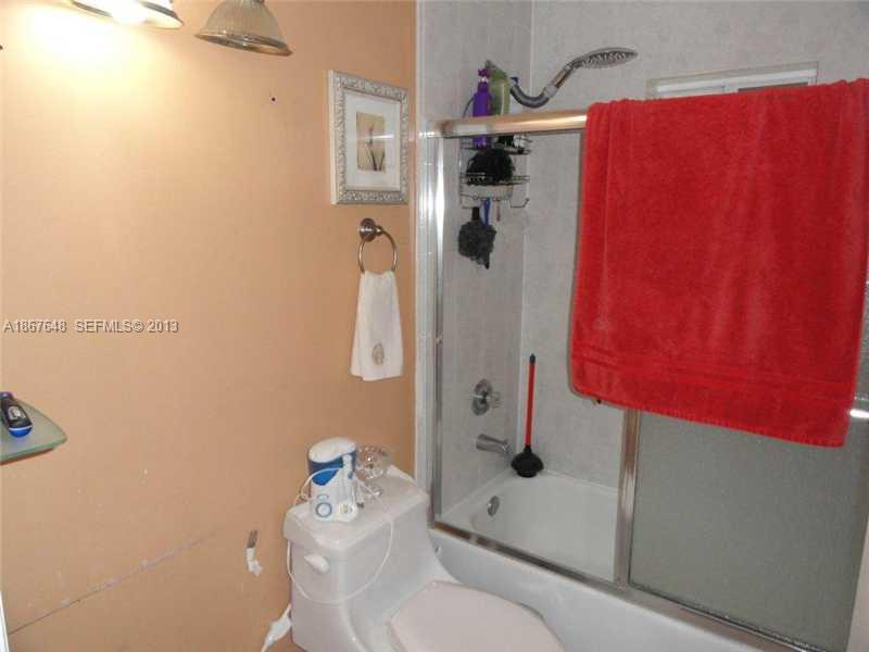 15636 Southwest 35th Terrace Miami, FL 33185 - Photo 11 of 18 a bathroom with a shower