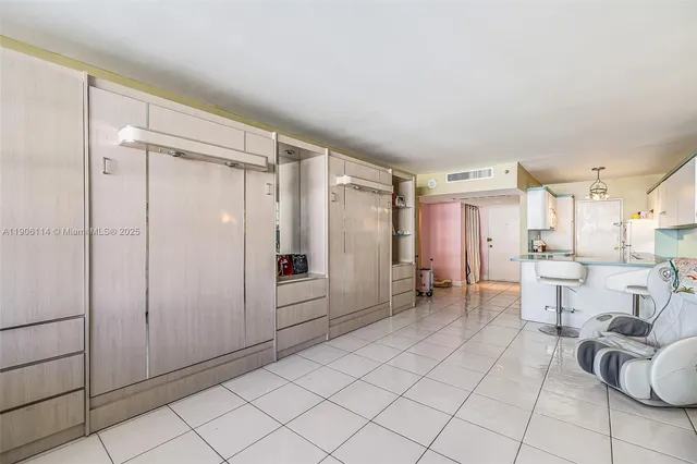 a spacious bathroom with a mirror and a shower