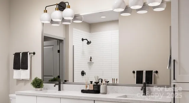 a bathroom with a sink vanity and a mirror