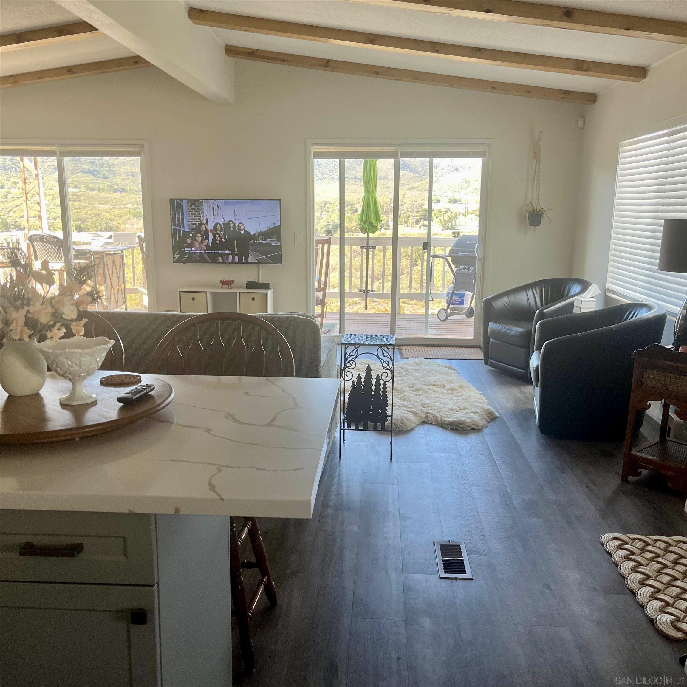35109 Highway 79, Unit SPACE/ Warner Springs, CA 92086 - Photo 1 of 54 a living room with furniture and a window