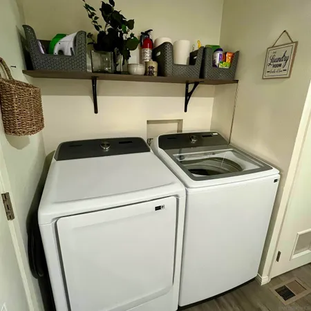 a utility room with dryer and washer