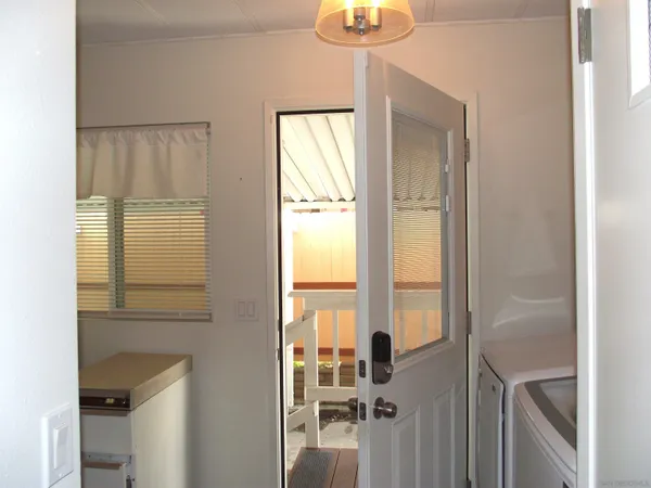 a view of an empty room with a window