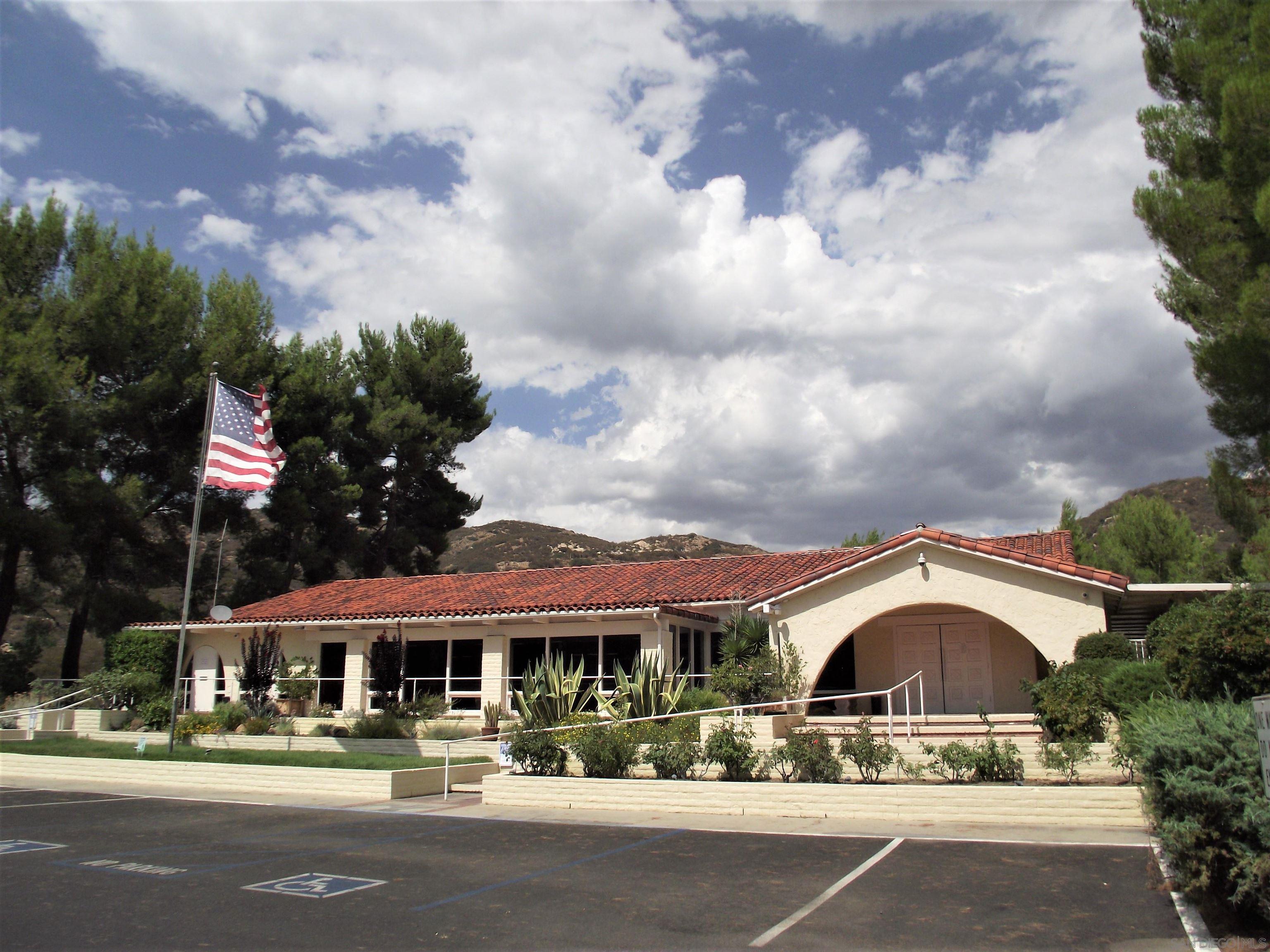 35109 Highway 79, Unit SPACE/ Warner Springs, CA 92086 - Photo 20 of 54 a front view of a building with lot of cars and trees