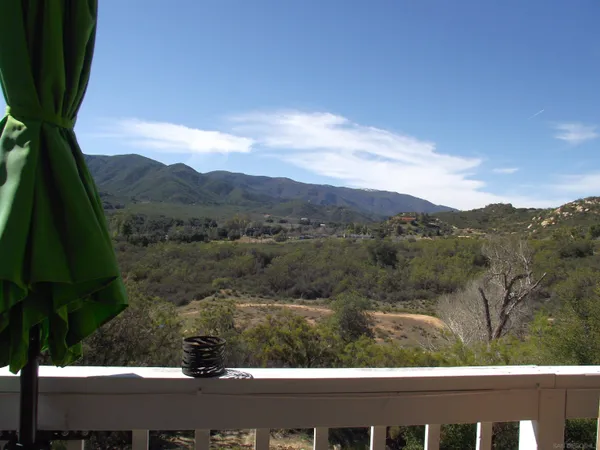 an aerial view of mountain with trees