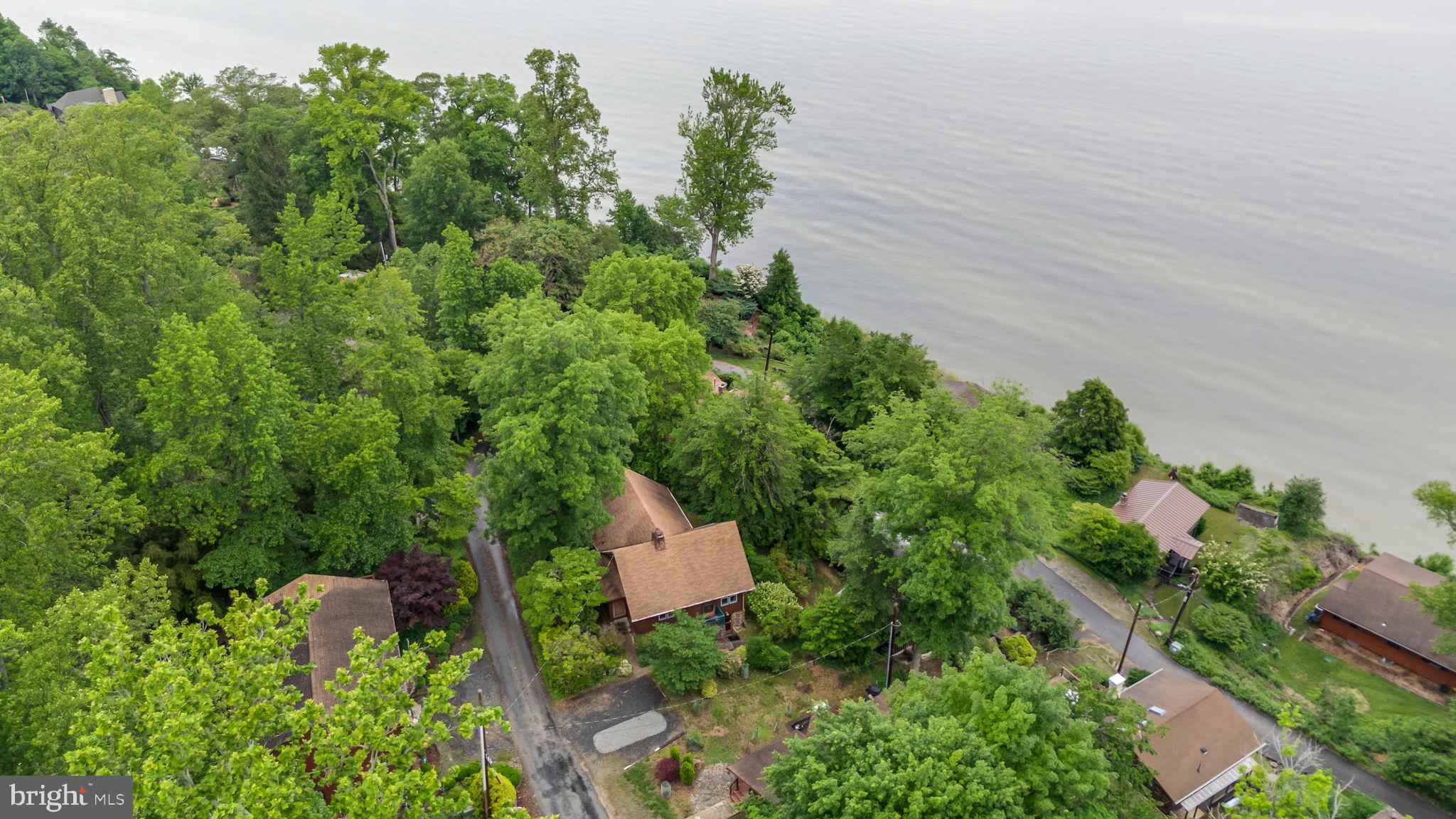 2138 Cedar Road Port Republic, MD 20676 - Photo 2 of 34 an aerial view of a house with a yard and outdoor seating