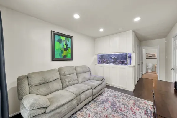 a living room with furniture and a couch