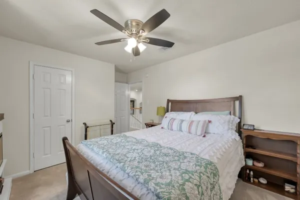 a view of a swimming pool with a yard