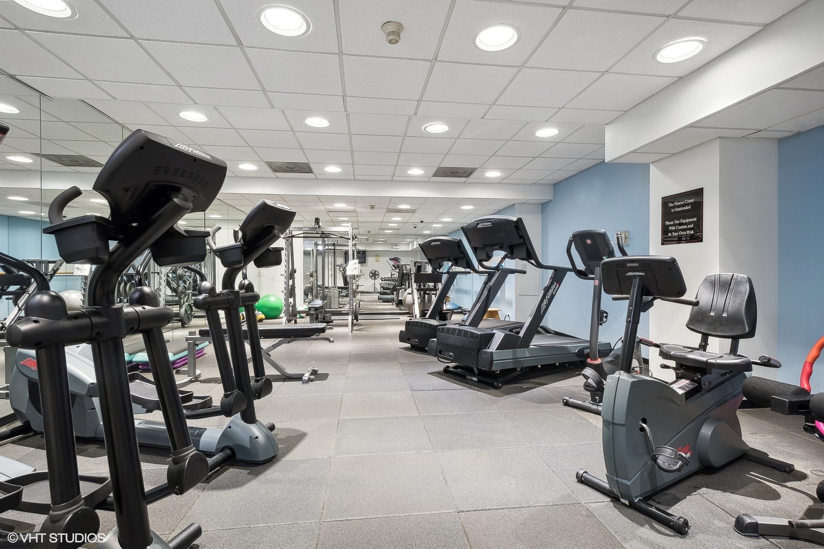 40 East Delaware Place, Unit 1003 Chicago, IL 60611 - Photo 20 of 22 a view of a room with gym equipment