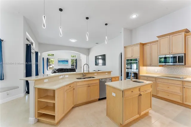 a view of a workspace with furniture