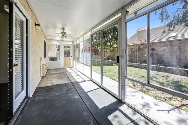 a view of a room with a large window