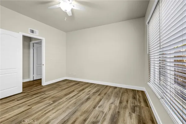 a view of a room with a large window