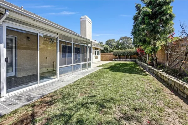 a view of a backyard with a garden