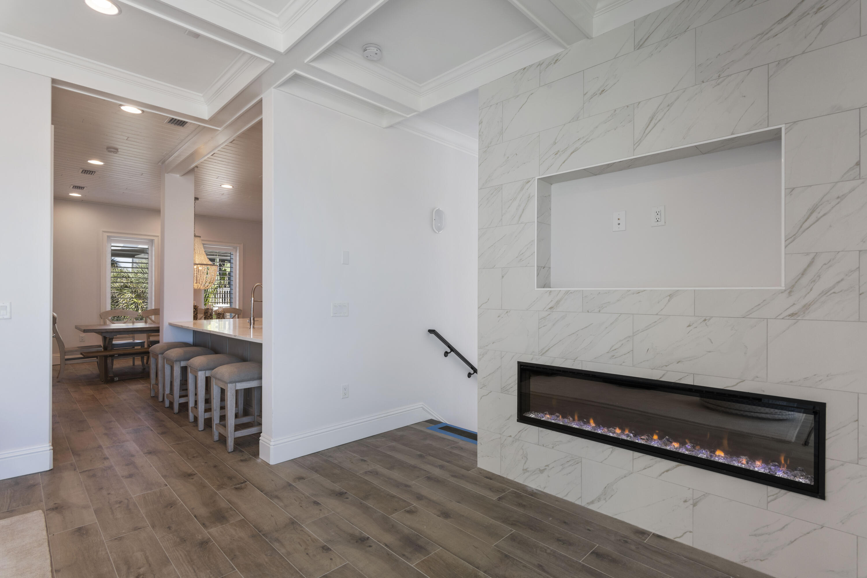 26 Azzurro Way, Unit B Santa Rosa Beach, FL 32459 - Photo 12 of 34 a view of a hallway view with wooden floor and furniture