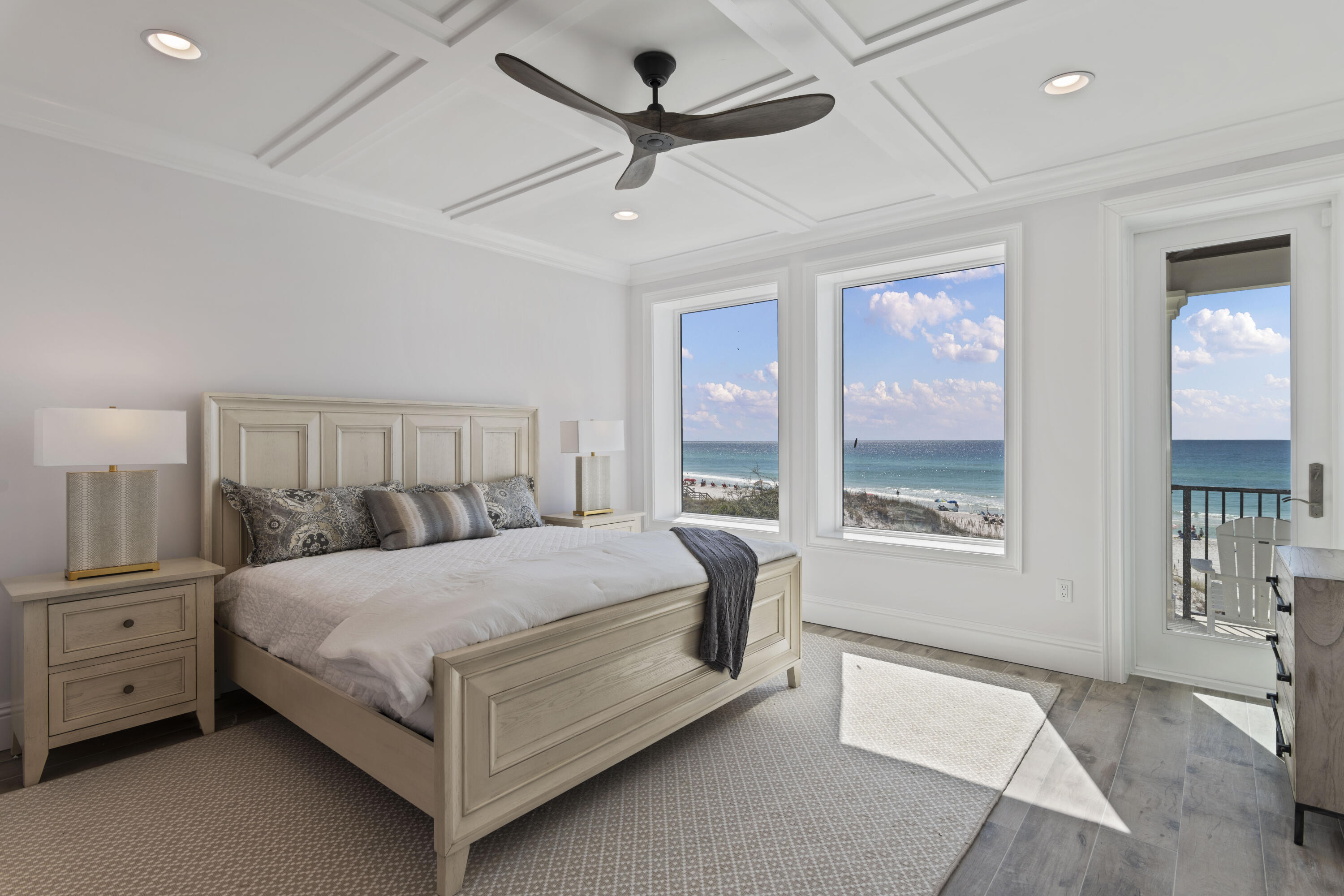 26 Azzurro Way, Unit B Santa Rosa Beach, FL 32459 - Photo 19 of 34 a bed sitting in a bedroom next to a window