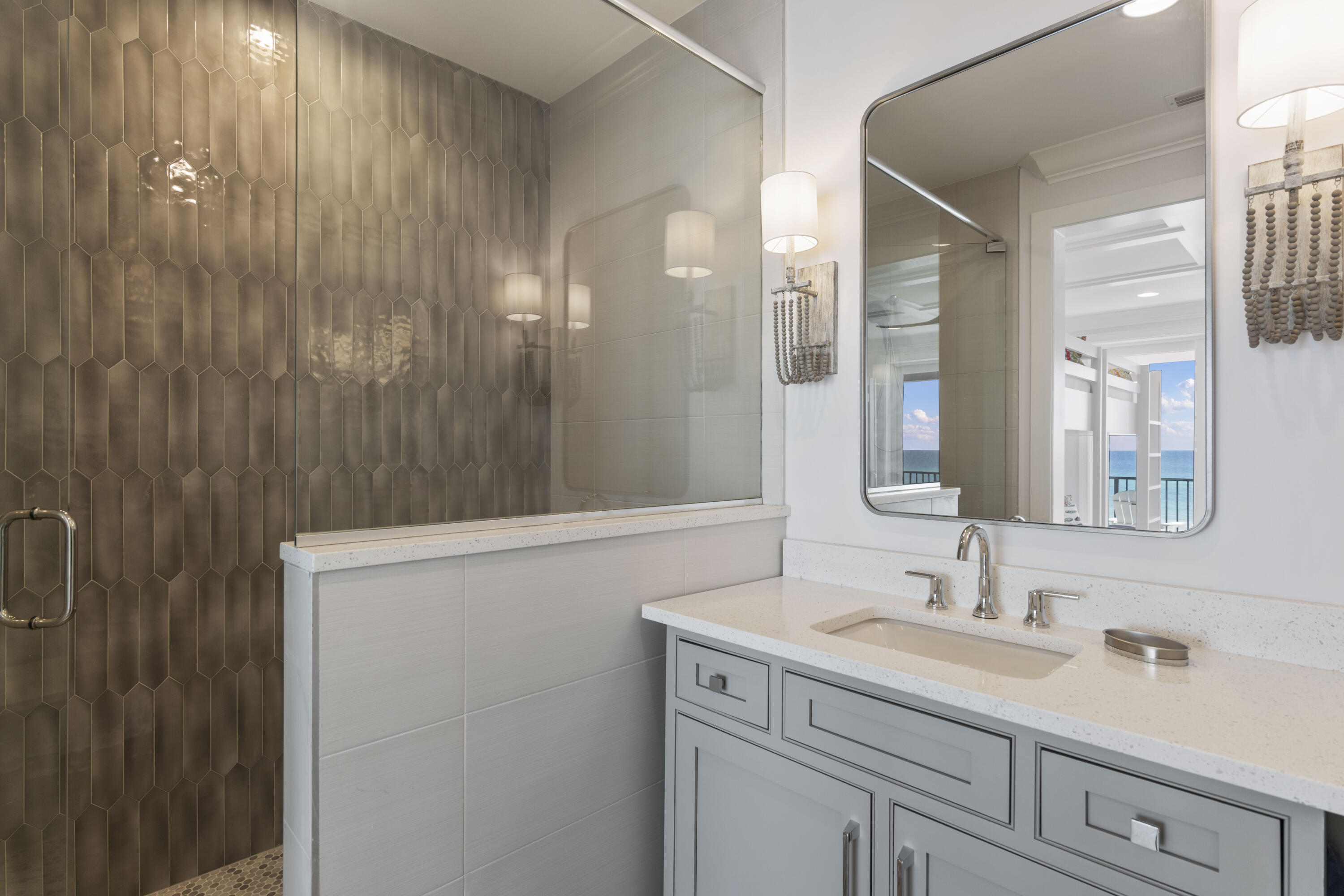 26 Azzurro Way, Unit B Santa Rosa Beach, FL 32459 - Photo 20 of 34 a bathroom with a sink a vanity and a mirror