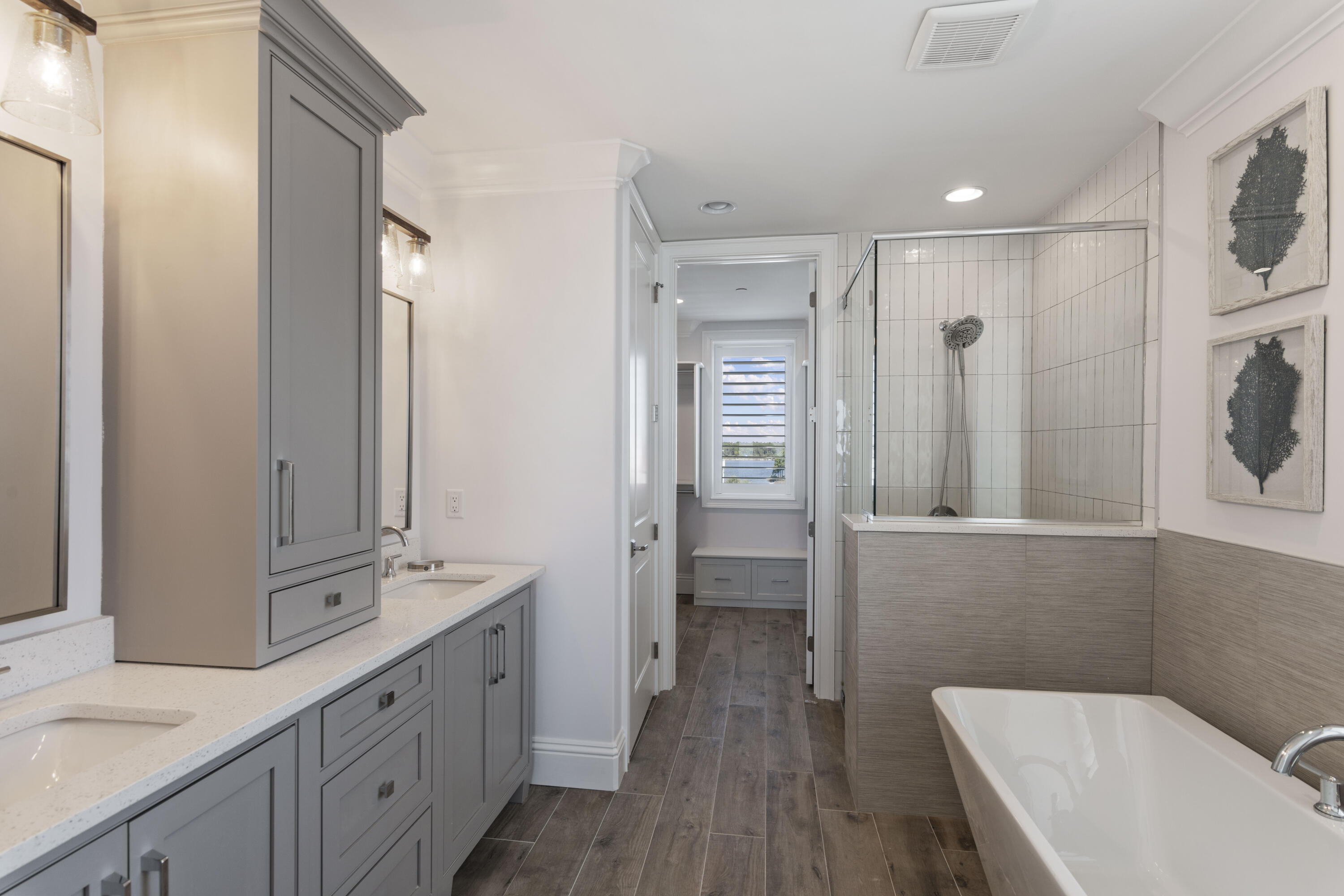 26 Azzurro Way, Unit B Santa Rosa Beach, FL 32459 - Photo 26 of 34 a spacious bathroom with a bathtub shower sink mirror and toilet